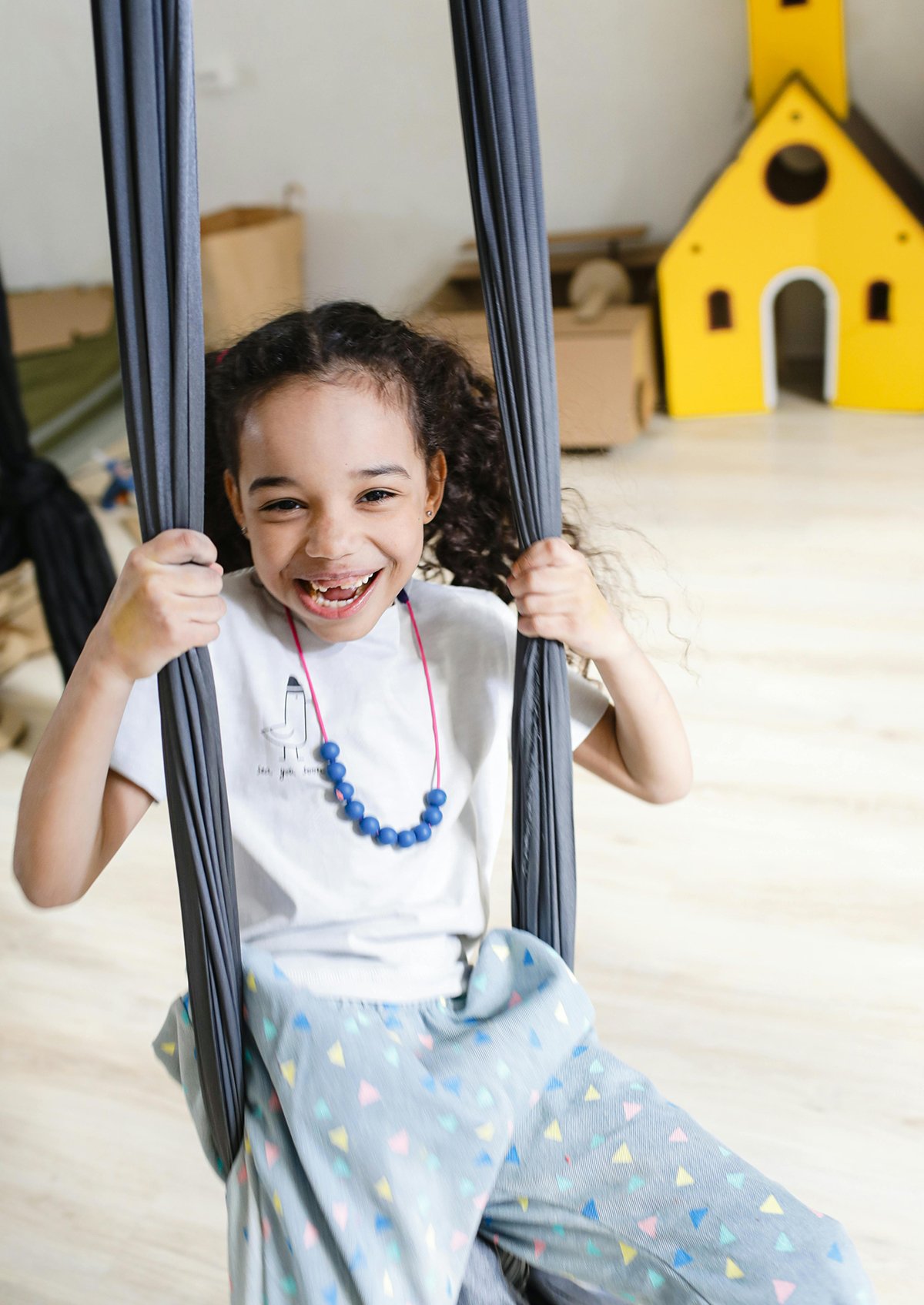 girl with autism on a swing